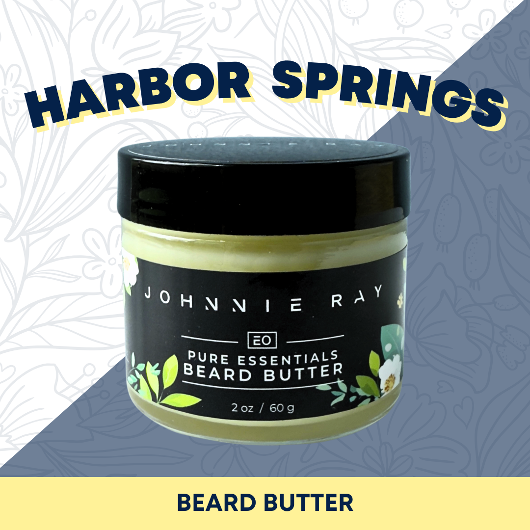 Jar of Johnnie Ray pure essentials beard butter with 'Harbor Springs' branding on a patterned background.