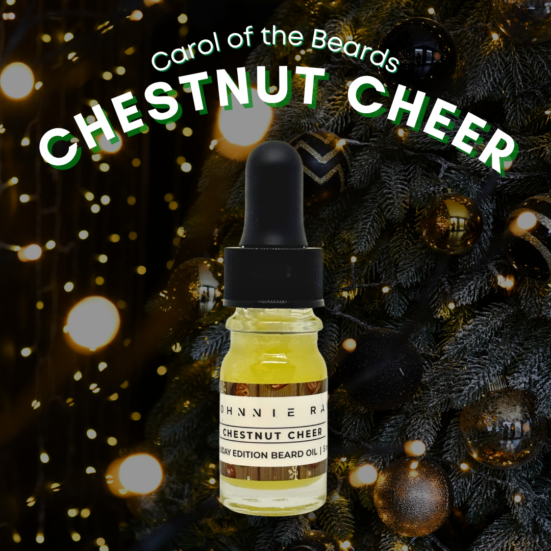 Bottle of 'Chestnut Cheer' beard oil with Christmas tree and lights in the background
