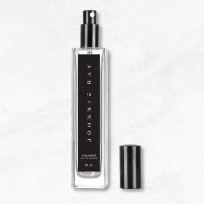 Johnnie Ray The Rhapsody Collection 50 mL Spray Cologne in a tall rectangular clear bottle with glossy black spray closure