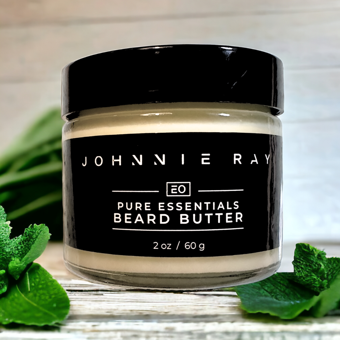 Jar of Johnnie Ray Coldwater Beard Butter with mint leaves