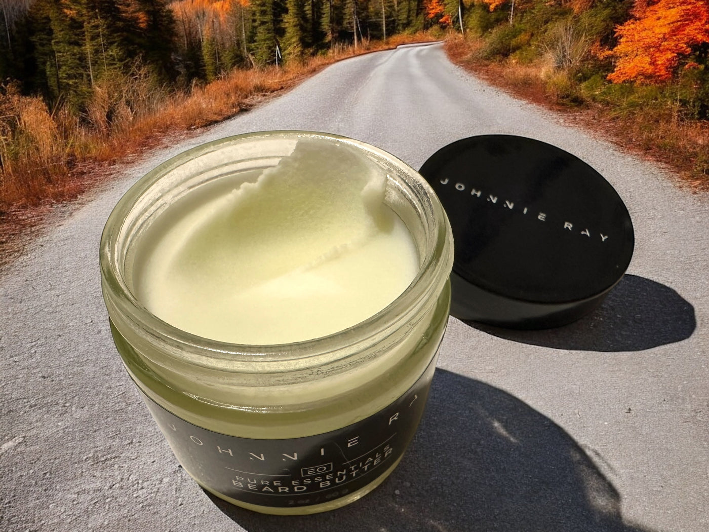 Johnnie Ray Pictured Rocks Beard Butter open jar to show smooth texture of the beard butter