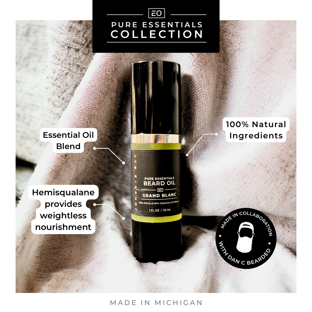 Pure Essentials Collection Graphic with a bottle of Beard oil on textured fabric and text "Essential Oil Blend" "100% Natural Ingredients" "Hemisqualane provides weightless nourishment" and "Made in Michigan"