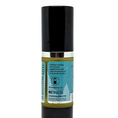 Johnnie Ray beard oil bottle with black cap and label showing scent description and Dan C Bearded logo on a white background